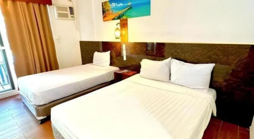 Bed in Roman Empire Panglao Boutique Resort
