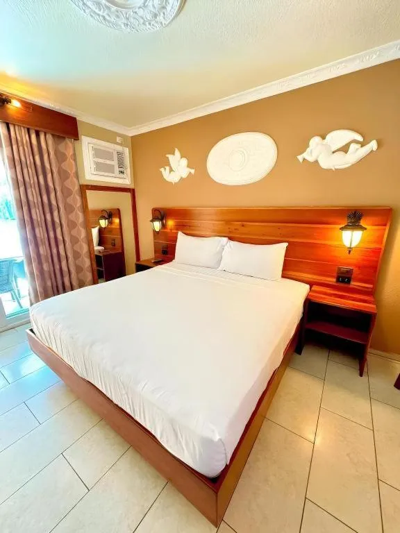 Bed in Roman Empire Panglao Boutique Resort