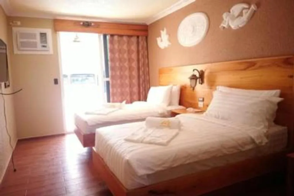 Bed in Roman Empire Panglao Boutique Resort