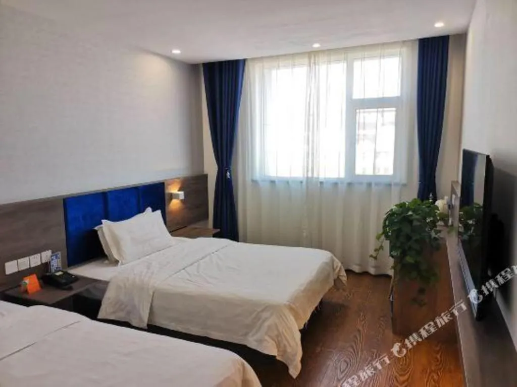 Bed in 7 Days Inn Lvliang Bus Terminal