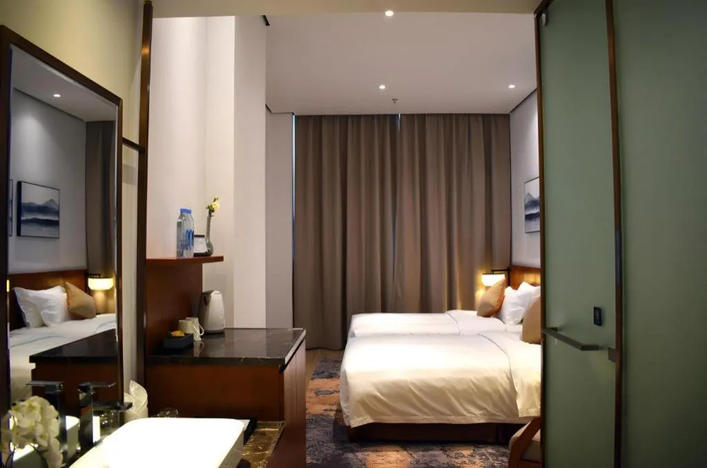 Bed in H Life Hotel (Shenzhen Sea World Branch)