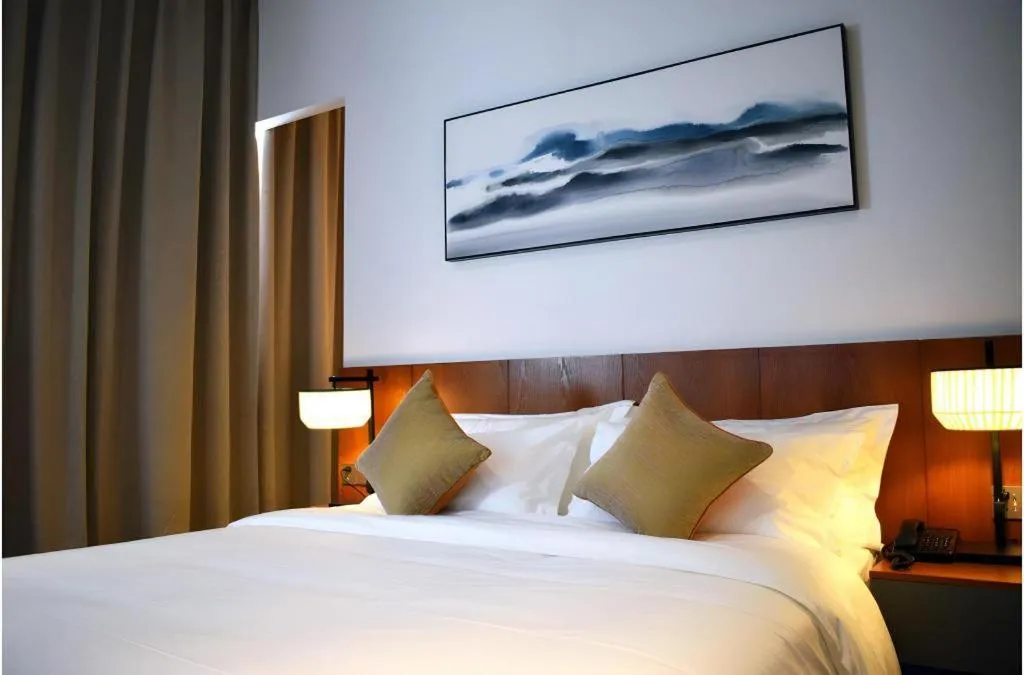 Bed in H Life Hotel (Shenzhen Sea World Branch)