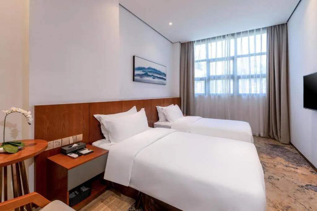 Bed in H Life Hotel (Shenzhen Sea World Branch)