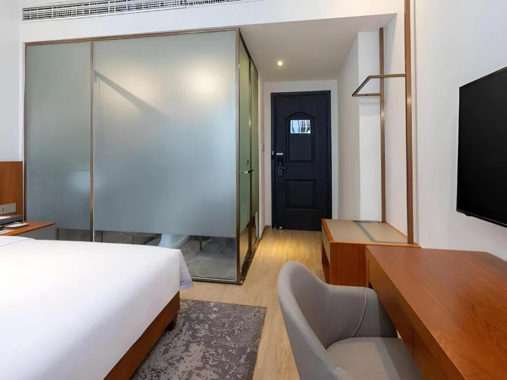 Bed in H Life Hotel (Shenzhen Sea World Branch)