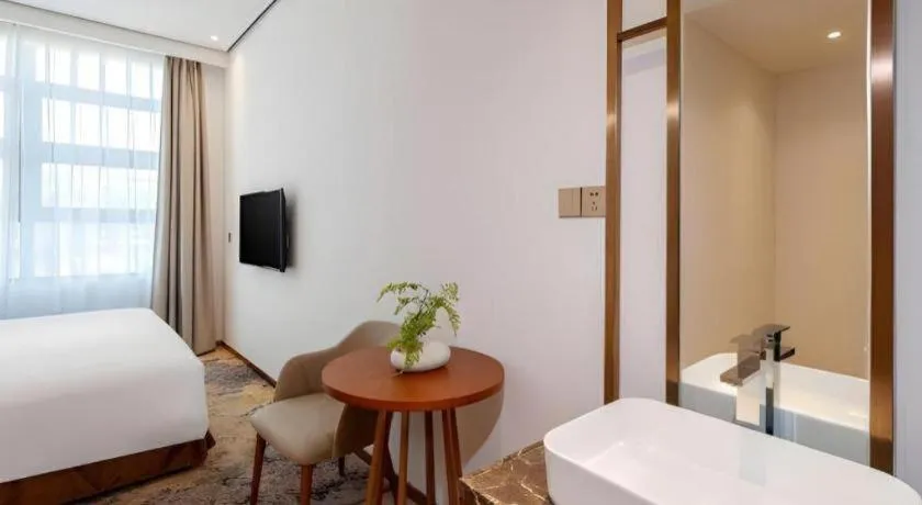 Bed in H Life Hotel (Shenzhen Sea World Branch)