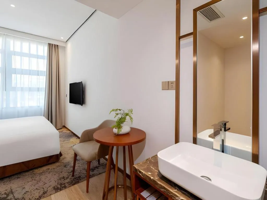 Bed in H Life Hotel (Shenzhen Sea World Branch)