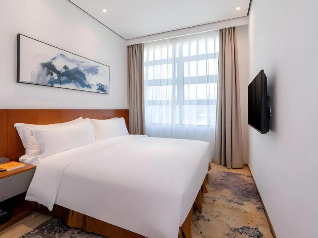 Bed in H Life Hotel (Shenzhen Sea World Branch)