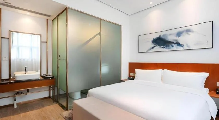 Bed in H Life Hotel (Shenzhen Sea World Branch)