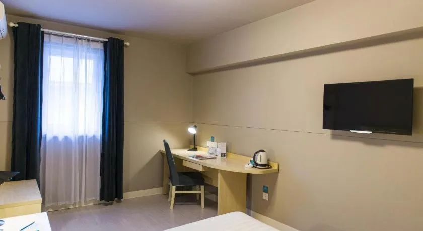 Bed in Jinjiang Inn Style Xinyang Railway Station Tianrun Plaza