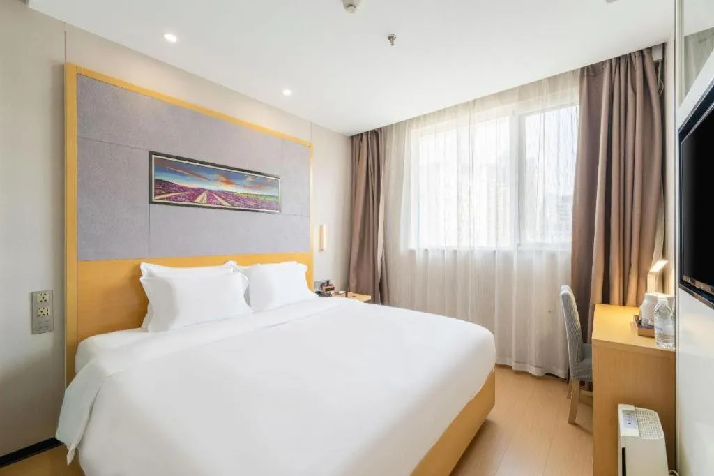 Bed in Lavande Hotel Beijing Guanganmen Lize Commercial Zone