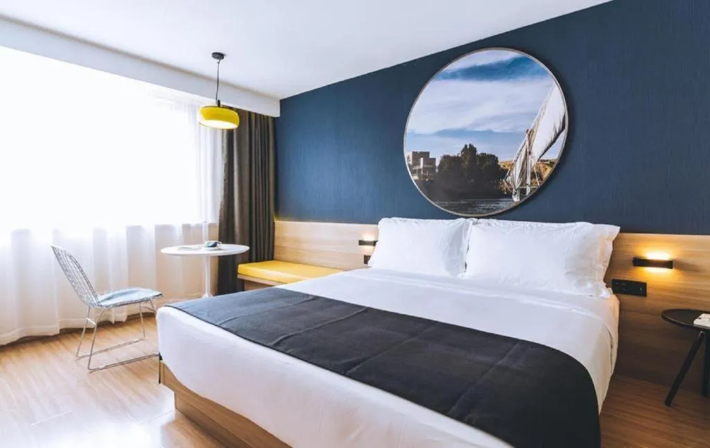 Bed in Ibis Styles Shanghai Qingpu Sports Center Hotel