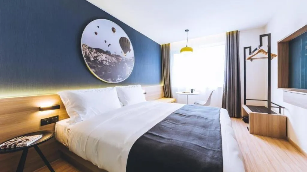 Bed in Ibis Styles Shanghai Qingpu Sports Center Hotel