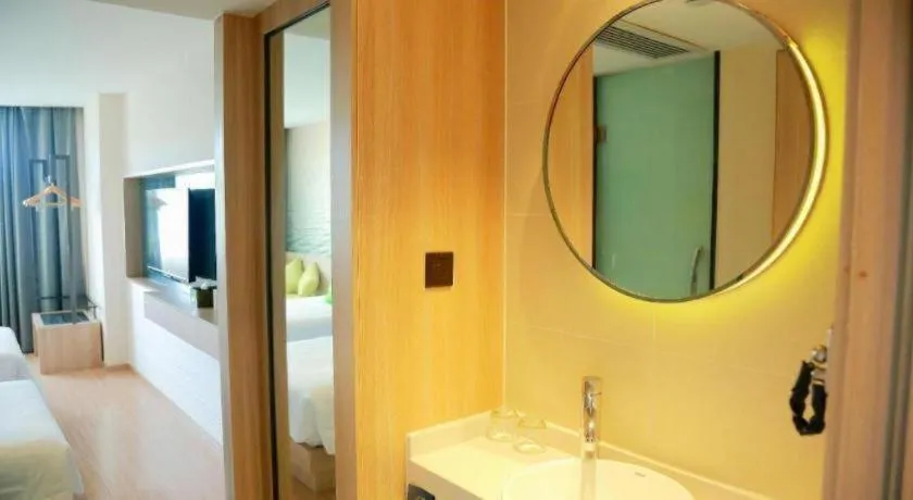 Bed in Ibis Styles Shanghai Qingpu Sports Center Hotel