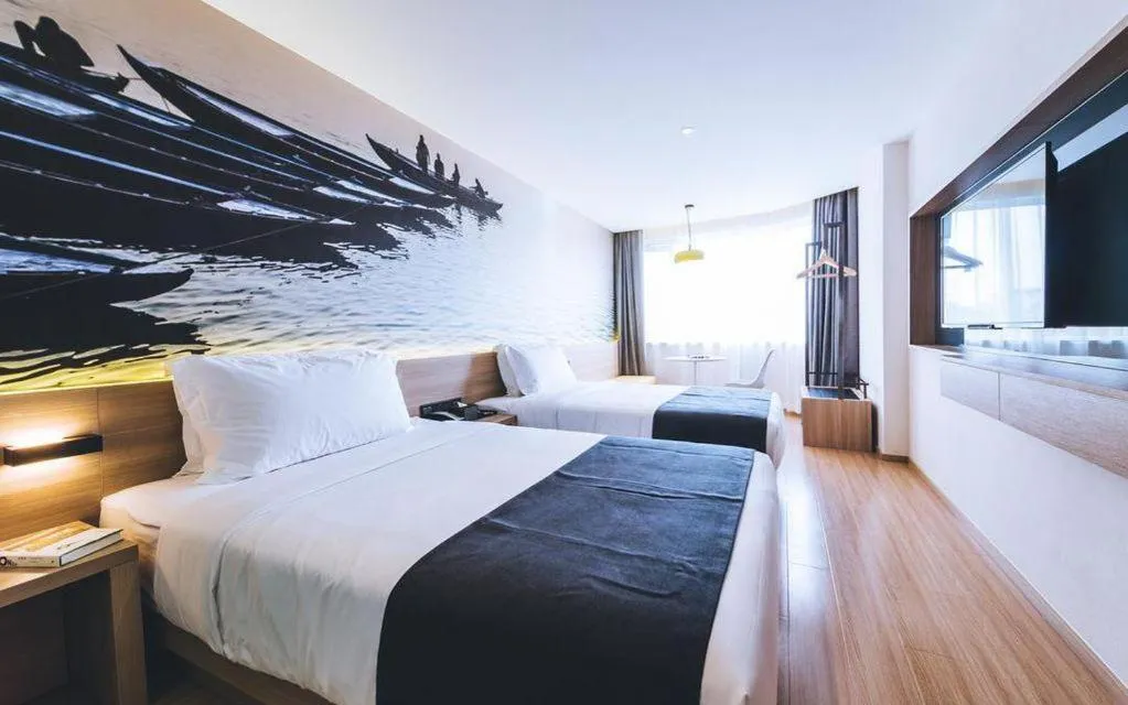 Bed in Ibis Styles Shanghai Qingpu Sports Center Hotel