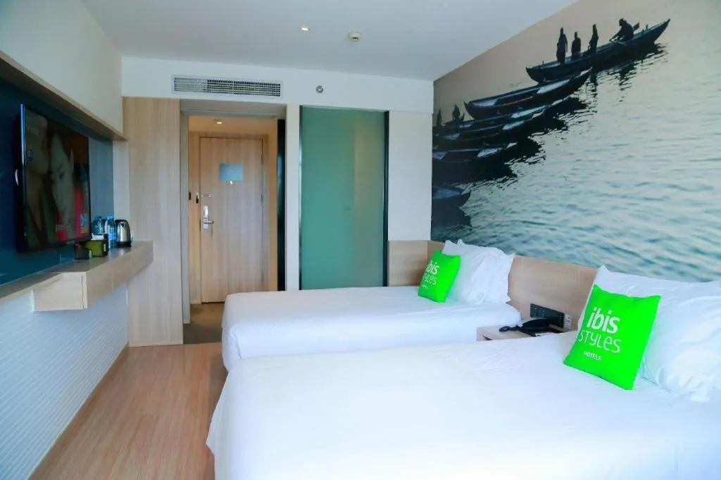 Bed in Ibis Styles Shanghai Qingpu Sports Center Hotel