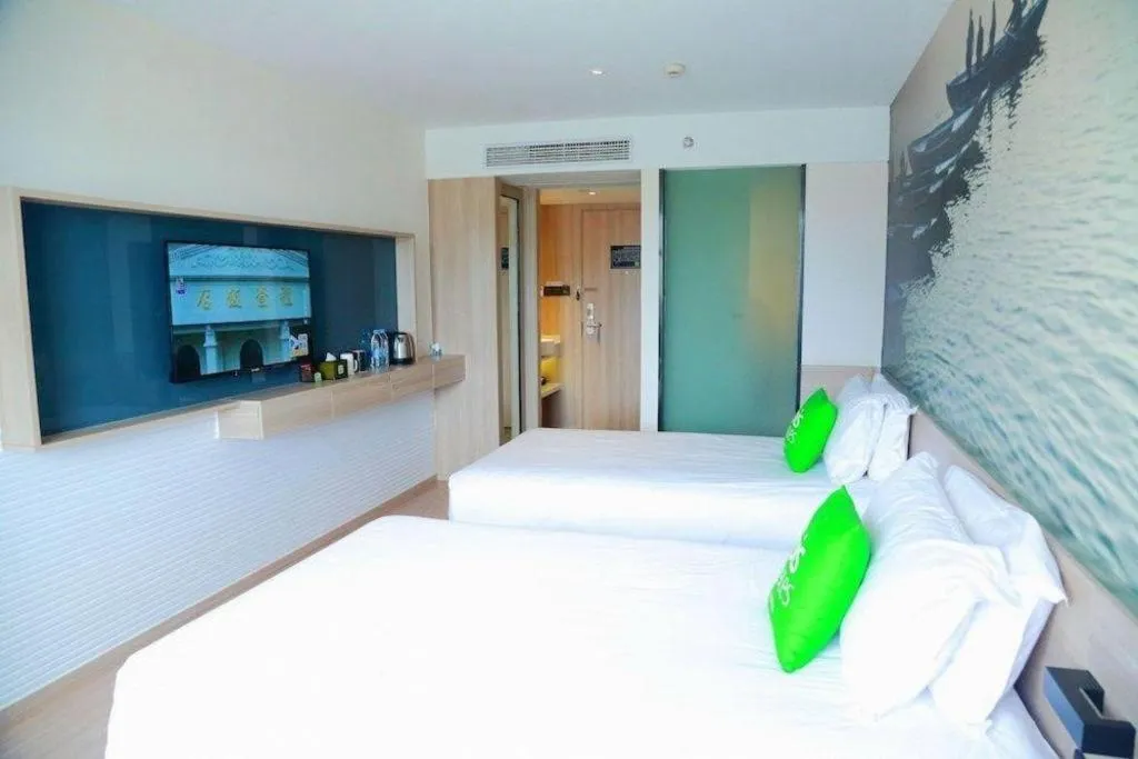 Bed in Ibis Styles Shanghai Qingpu Sports Center Hotel