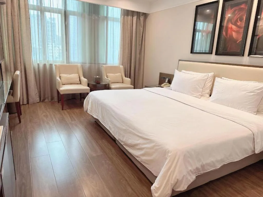 Bed in New Regent Hotel