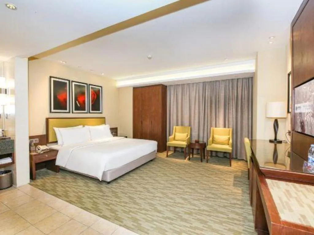 Bed in New Regent Hotel