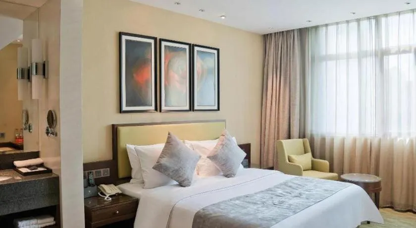 Bed in New Regent Hotel