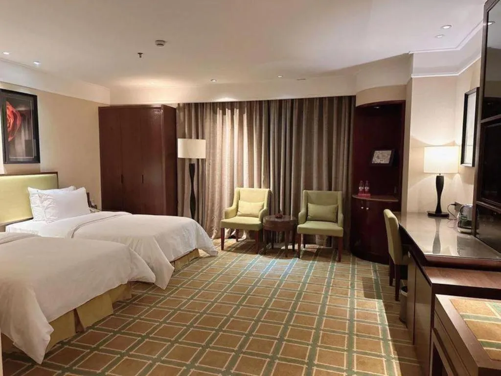 Bed in New Regent Hotel