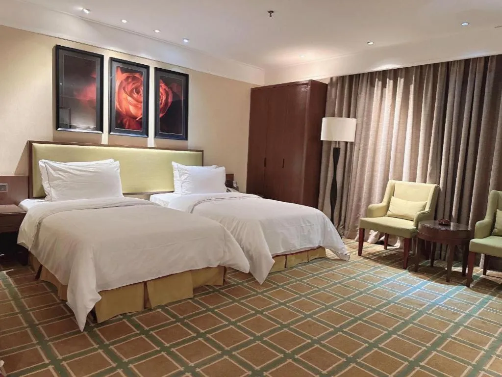 Bed in New Regent Hotel