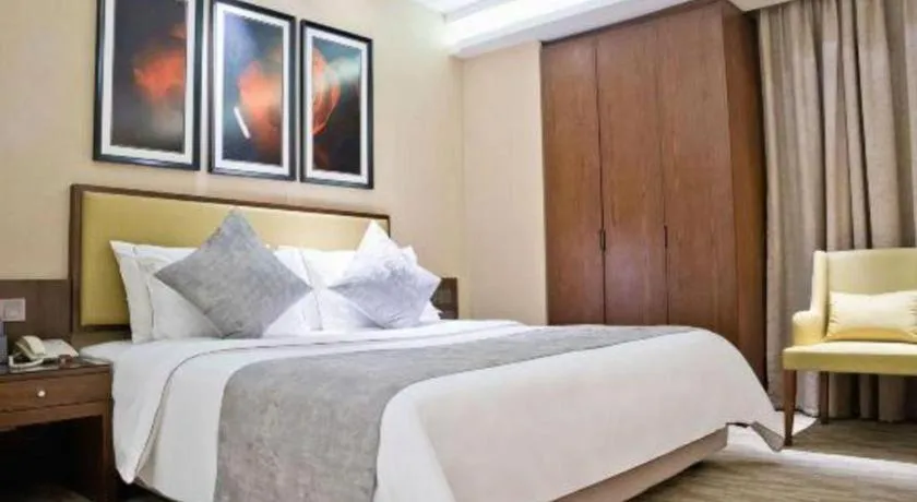 Bed in New Regent Hotel