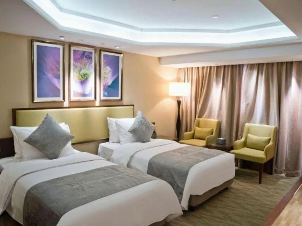 Bed in New Regent Hotel