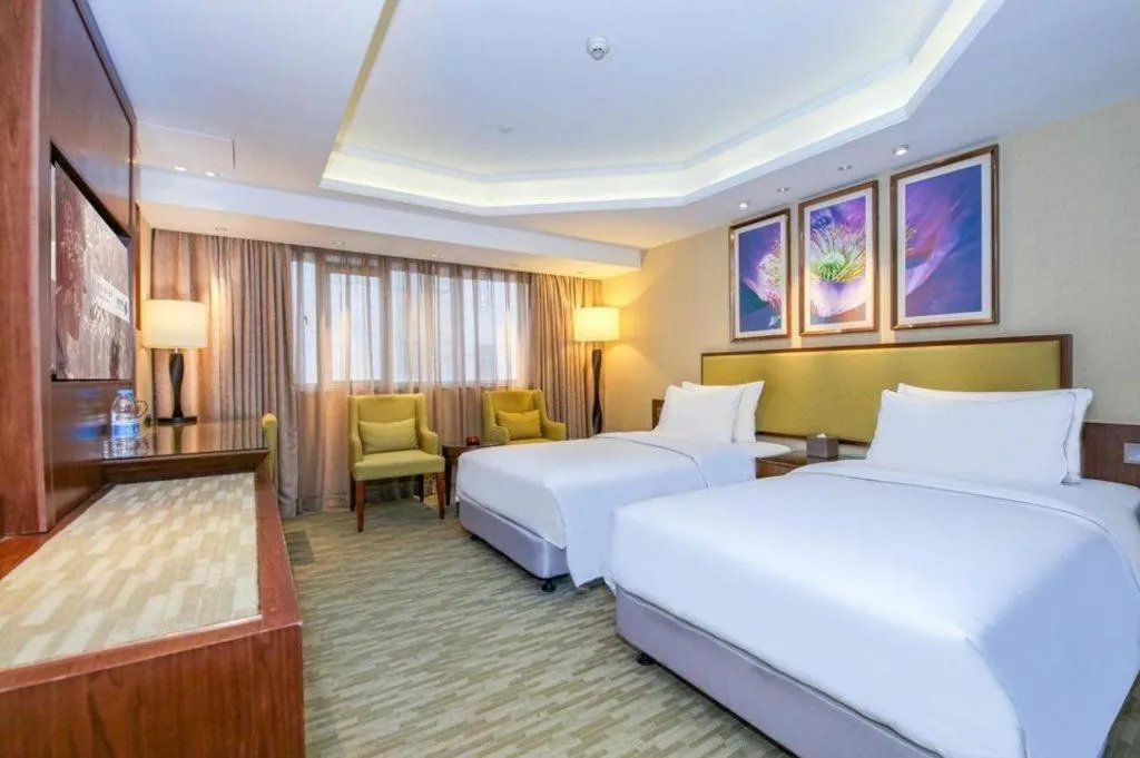 Bed in New Regent Hotel