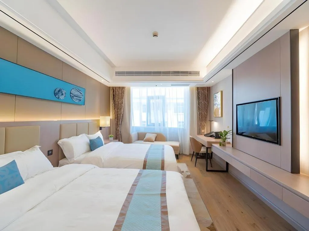 Bed in GreenTree Eastern Dali Railway Station Hotel