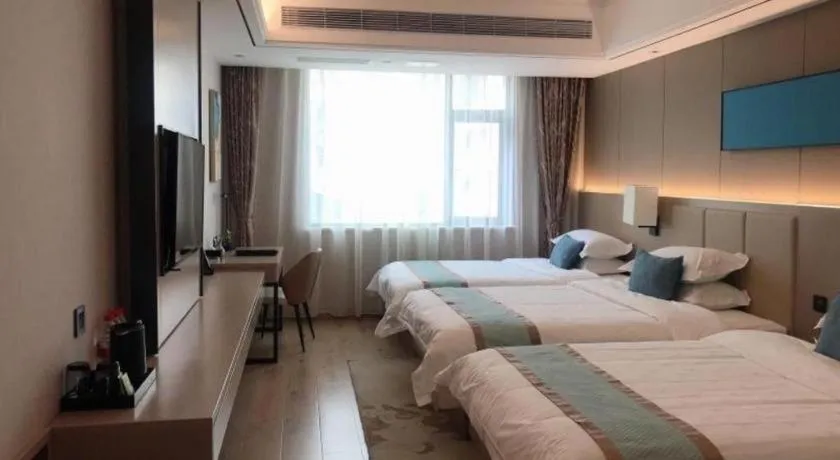 Bed in GreenTree Eastern Dali Railway Station Hotel