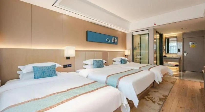 Bed in GreenTree Eastern Dali Railway Station Hotel