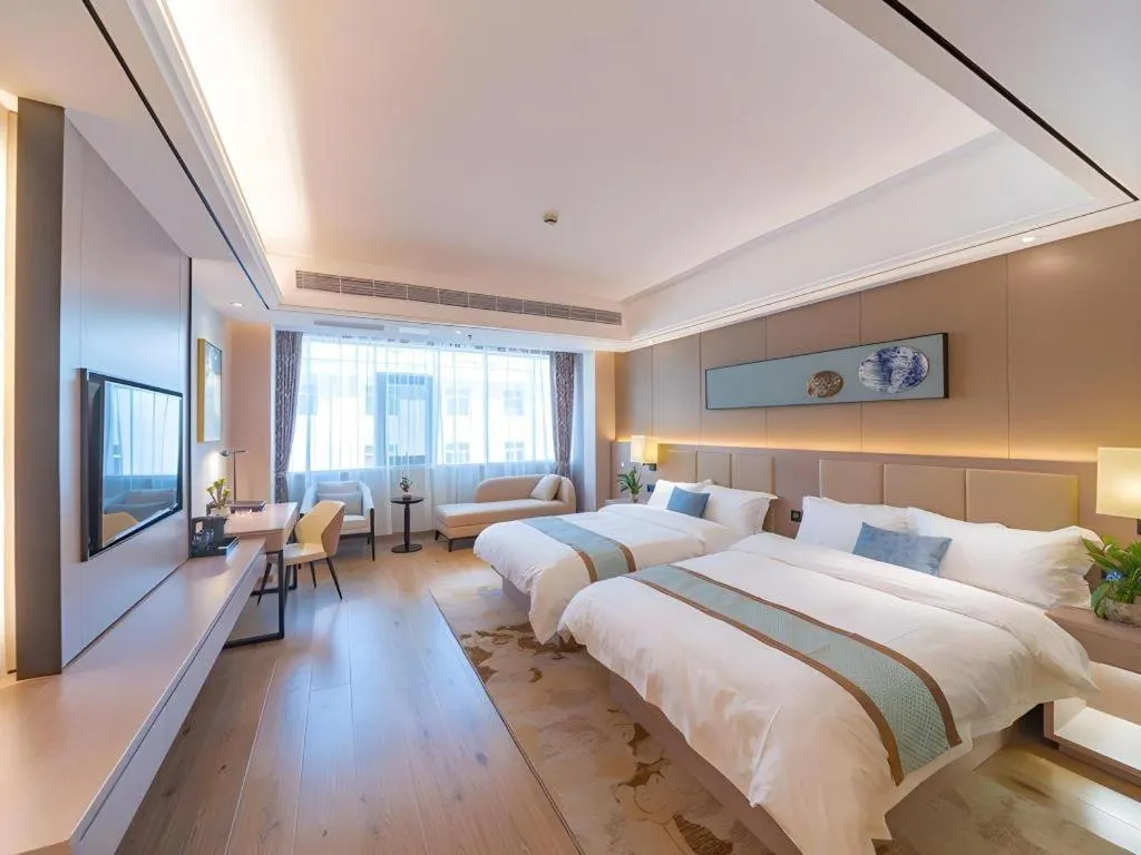 Bed in GreenTree Eastern Dali Railway Station Hotel