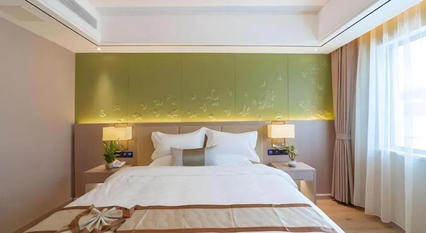 Bed in GreenTree Eastern Dali Railway Station Hotel