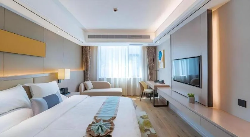 Bed in GreenTree Eastern Dali Railway Station Hotel