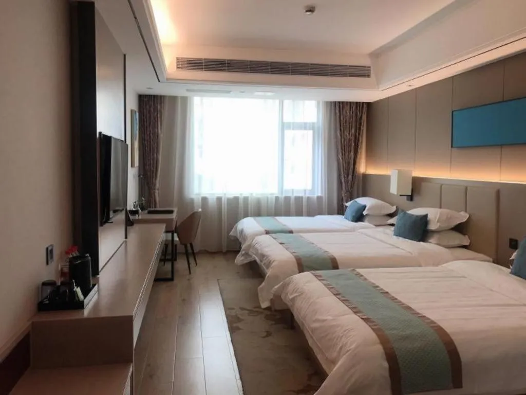 Bed in GreenTree Eastern Dali Railway Station Hotel