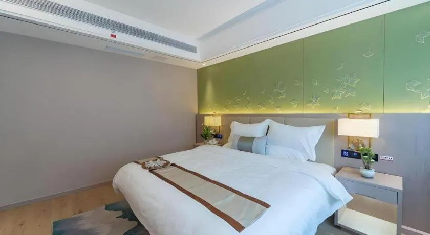 Bed in GreenTree Eastern Dali Railway Station Hotel