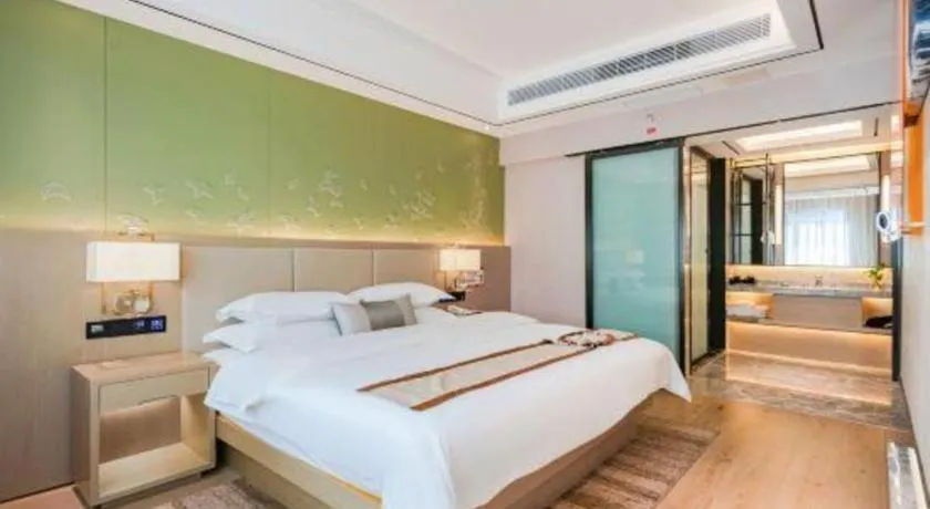 Bed in GreenTree Eastern Dali Railway Station Hotel