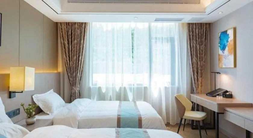 Bed in GreenTree Eastern Dali Railway Station Hotel