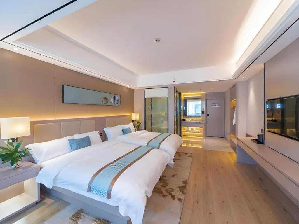 Bed in GreenTree Eastern Dali Railway Station Hotel