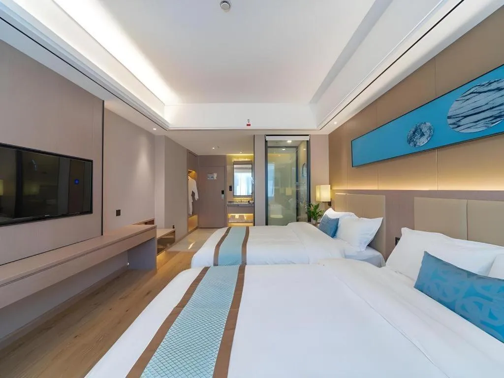 Bed in GreenTree Eastern Dali Railway Station Hotel