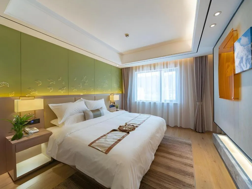 Bed in GreenTree Eastern Dali Railway Station Hotel