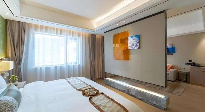 Bed in GreenTree Eastern Dali Railway Station Hotel