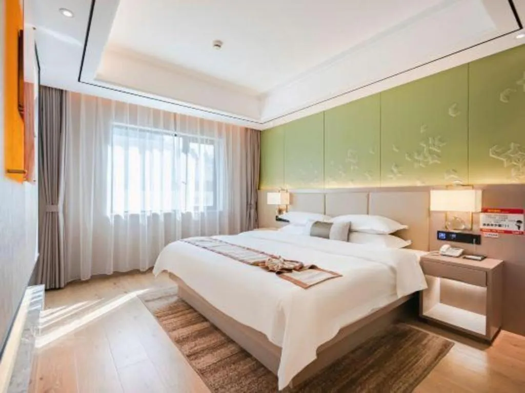 Bed in GreenTree Eastern Dali Railway Station Hotel