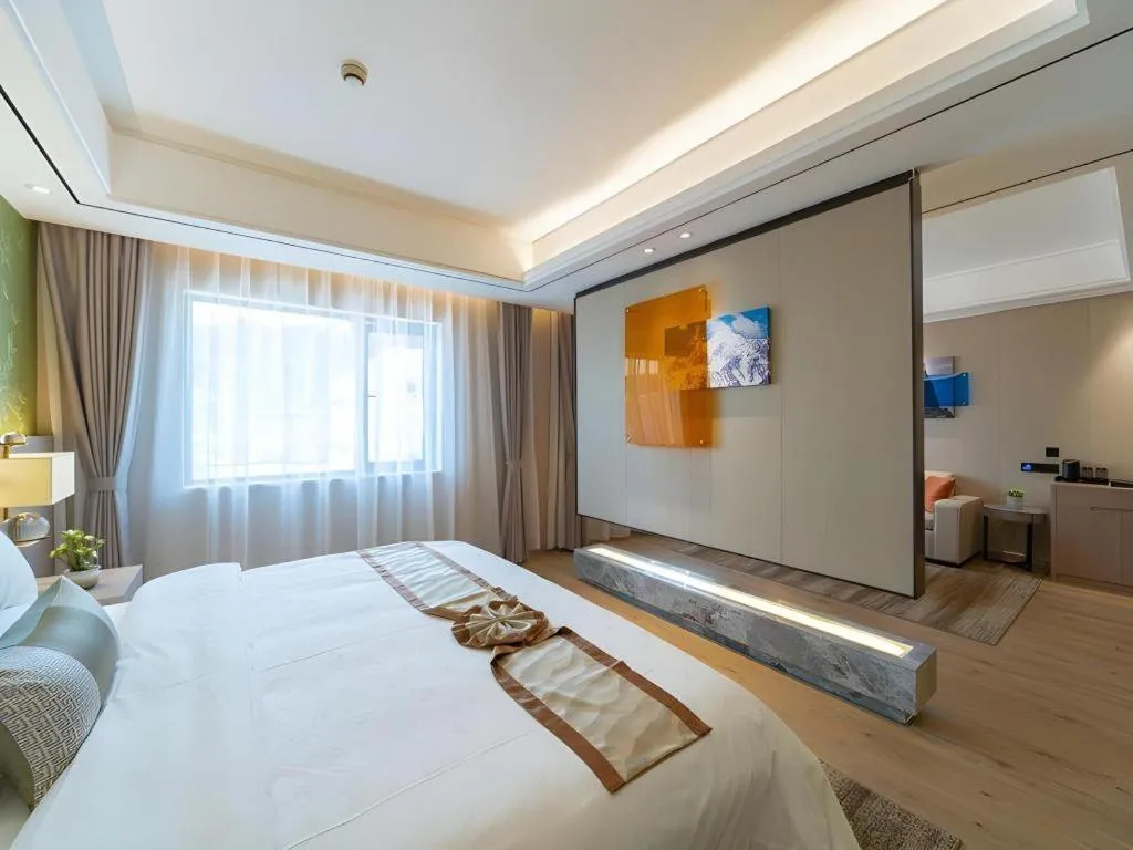 Bed in GreenTree Eastern Dali Railway Station Hotel