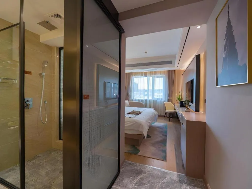 Bed in GreenTree Eastern Dali Railway Station Hotel