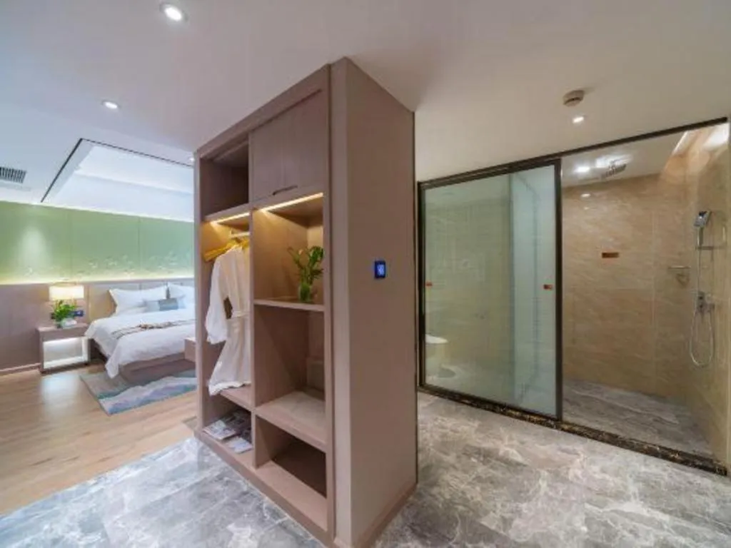 Bed in GreenTree Eastern Dali Railway Station Hotel