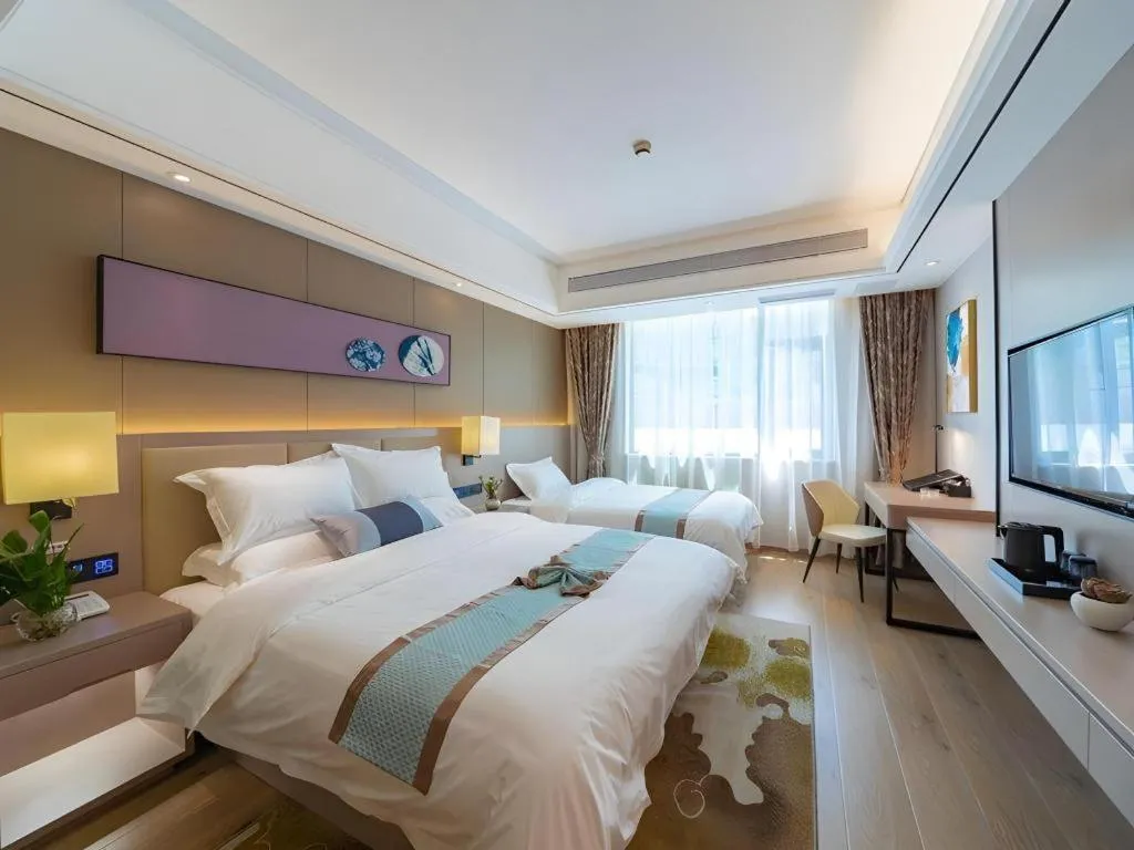 Bed in GreenTree Eastern Dali Railway Station Hotel