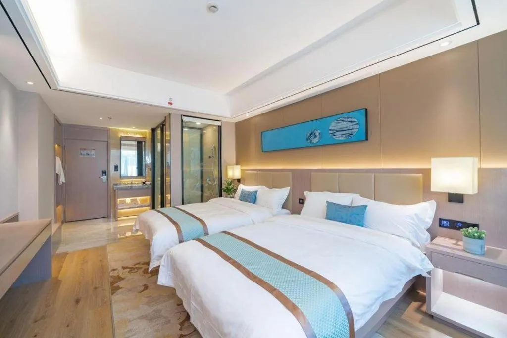 Bed in GreenTree Eastern Dali Railway Station Hotel