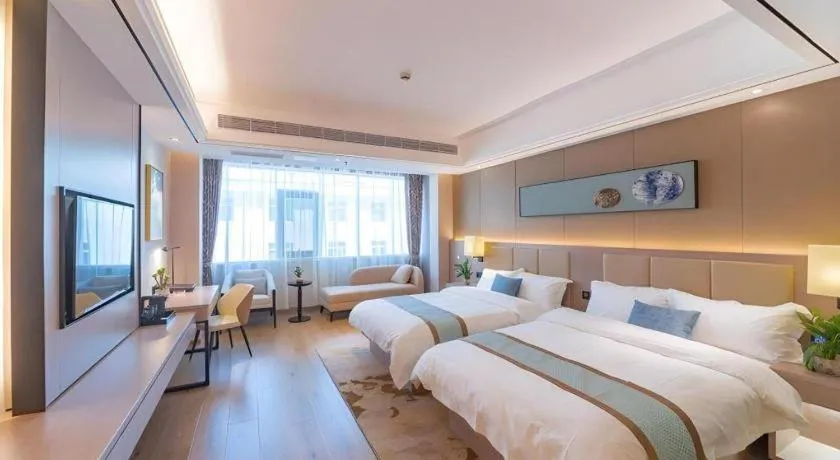 Bed in GreenTree Eastern Dali Railway Station Hotel