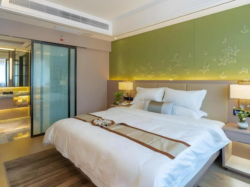 Bed in GreenTree Eastern Dali Railway Station Hotel